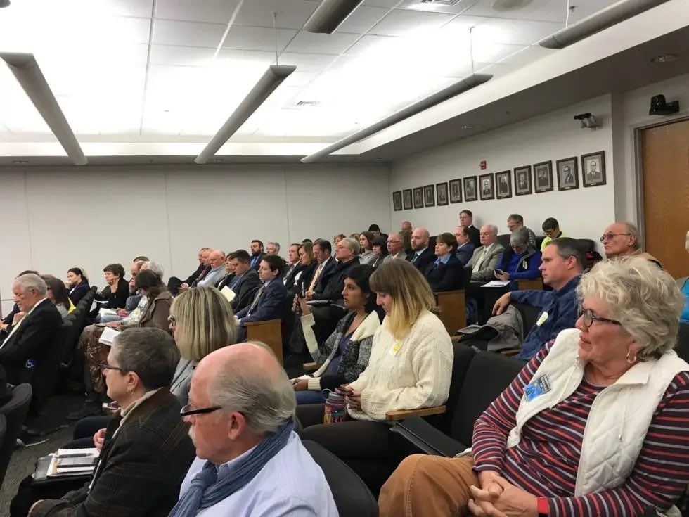 Citizens in the Kentucky Government Building hearing room