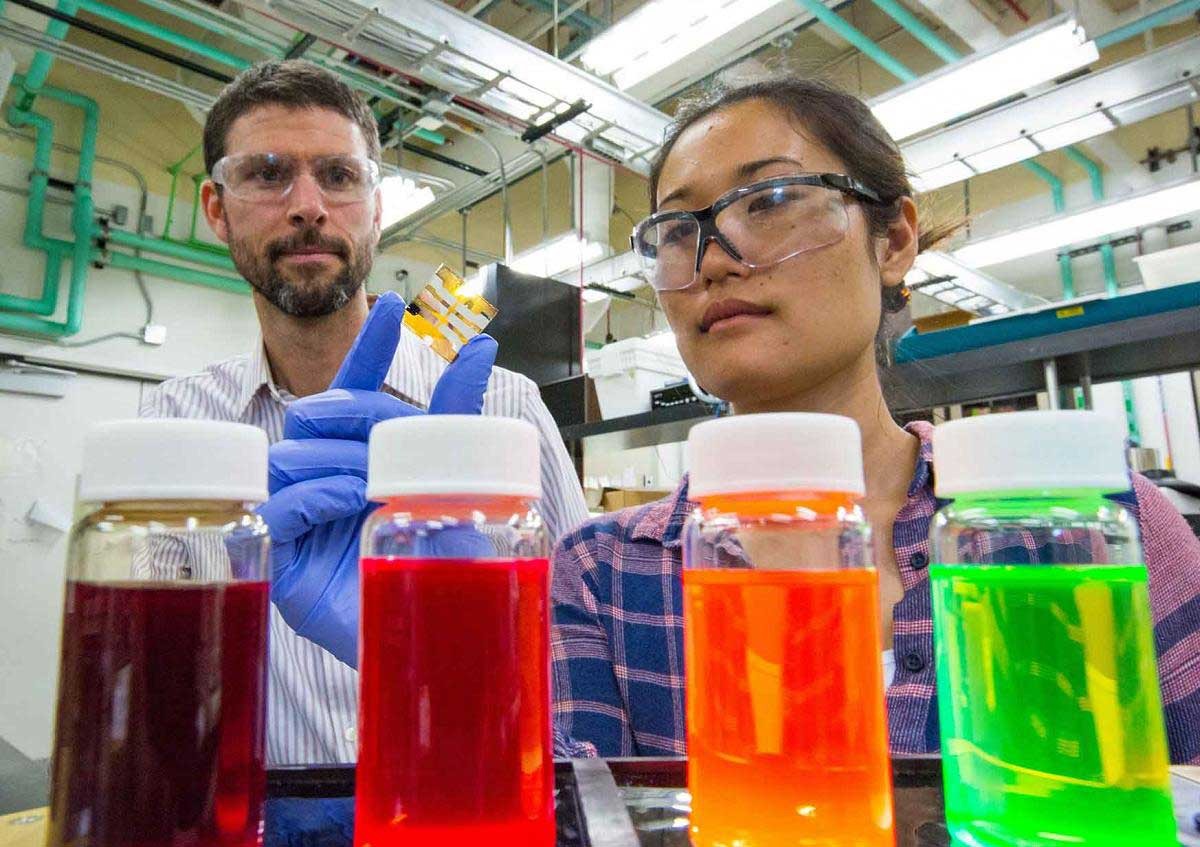 researchers working on photovoltaic paint