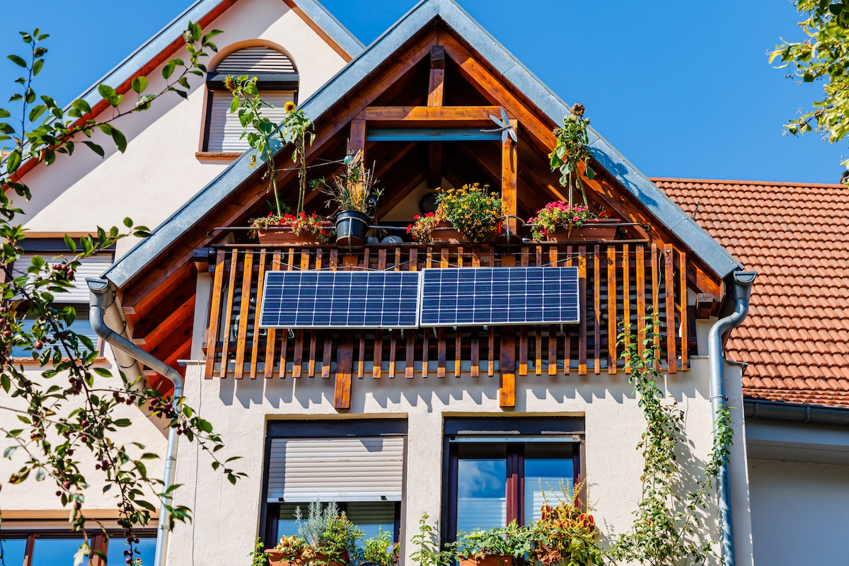 solar panels on the side of a balcony