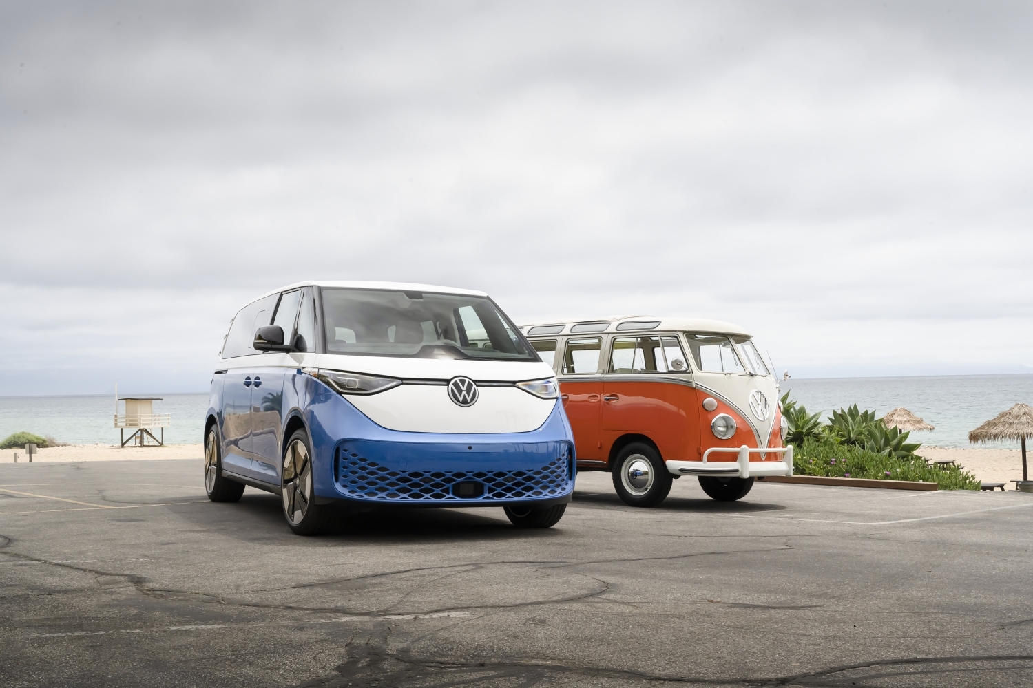 volkswagen ID Buzz ev next to old vw bus